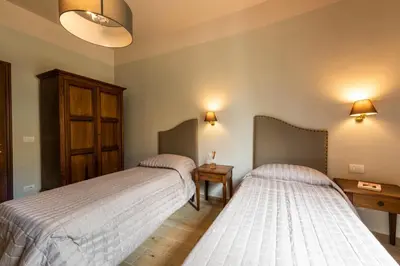 Letto o letti in una camera di Apartments Florence - Ariento Giuditta 2 bdr