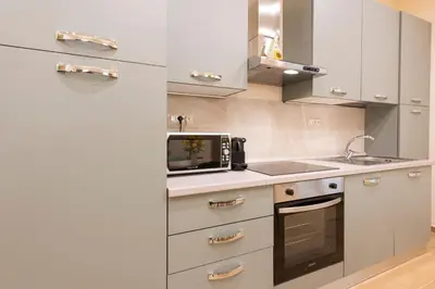 Cucina o angolo cottura di Mercato Contemporary Apartment by Mmega
