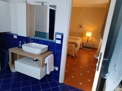 Letto o letti in una camera di La casetta del poggio
