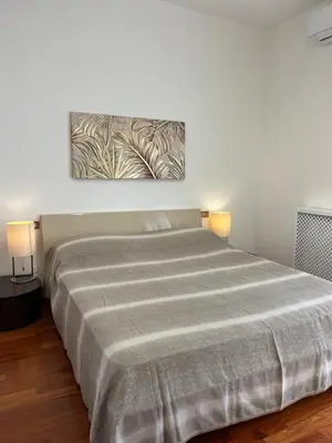 Letto o letti in una camera di Suite Piero della Francesca