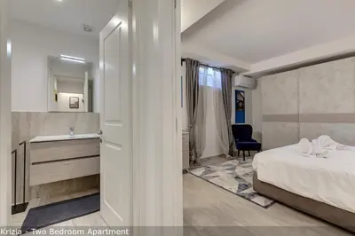 Letto o letti in una camera di Bice & Krizia Apartments by Mamo Florence