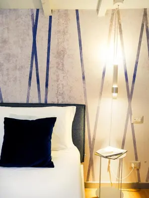Letto o letti in una camera di Residenza Carlotta - Luxury and design beside Arno
