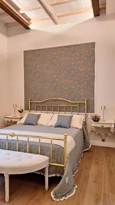 Letto o letti in una camera di Messer Niccolò - Apartment in Florence