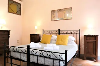 Letto o letti in una camera di Wine Apartments Florence Pomino