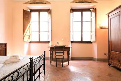 Letto o letti in una camera di Wine Apartments Florence Pomino