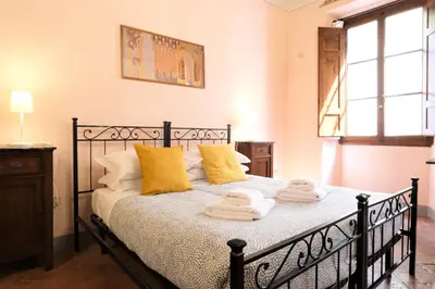 Letto o letti in una camera di Wine Apartments Florence Pomino