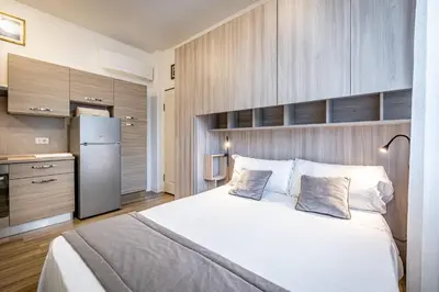 Letto o letti in una camera di YiD business and turistic studio