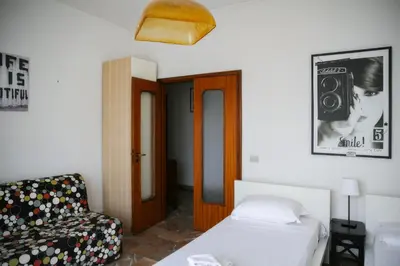Letto o letti in una camera di Quaint 2-BR outside ZTL