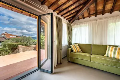Area soggiorno di YiD Cozy House in Fiesole with Jacuzzi