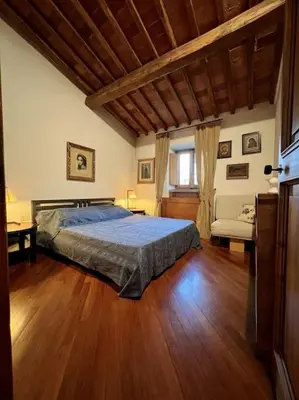 Letto o letti in una camera di Casa degli Ori