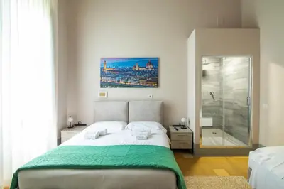 Letto o letti in una camera di Buonarroti Boutique Apartment