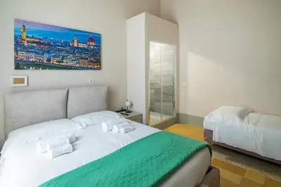 Letto o letti in una camera di Buonarroti Boutique Apartment
