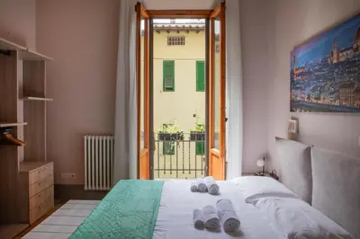 Letto o letti in una camera di Buonarroti Boutique Apartment