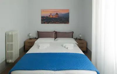 Letto o letti in una camera di Vespucci Imperial House