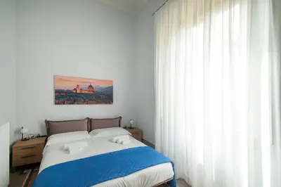 Letto o letti in una camera di Vespucci Imperial House