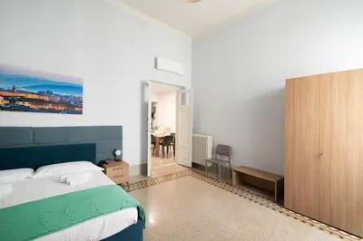 Letto o letti in una camera di Vespucci Imperial House