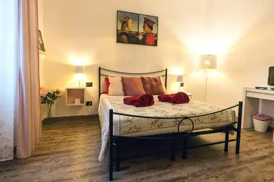 Letto o letti in una camera di TINA HOUSE FLORENCE