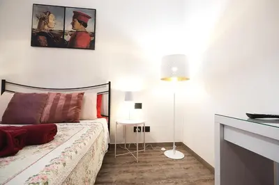 Letto o letti in una camera di TINA HOUSE FLORENCE