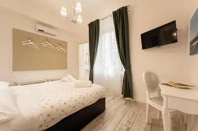 Letto o letti in una camera di Keys of Italy - Canne26 - Modern chic two bedrooms apartment
