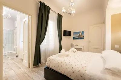 Letto o letti in una camera di Keys of Italy - Canne26 - Modern chic two bedrooms apartment