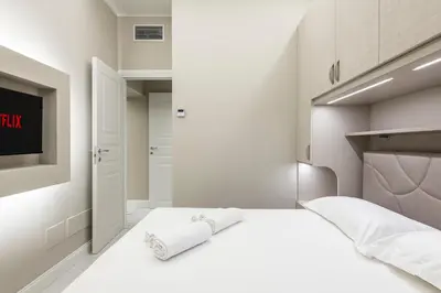 Letto o letti in una camera di 15 min Ponte Vecchio - Oltrarno Luxury Apartment