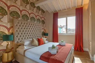 Letto o letti in una camera di Acciaiuoli Penthouse Florence Terrace View