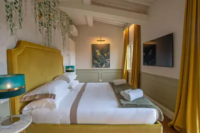 Letto o letti in una camera di Acciaiuoli Penthouse Florence Terrace View