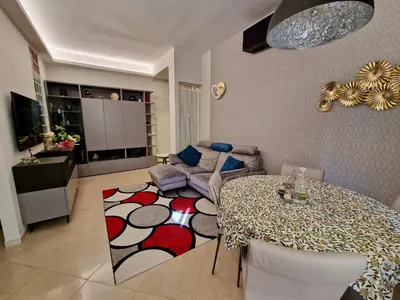 Area soggiorno di Novoli Chic: Cuore di Firenze