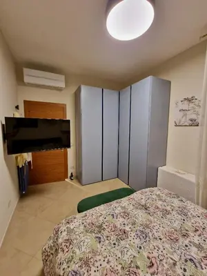 Letto o letti in una camera di Novoli Chic: Cuore di Firenze