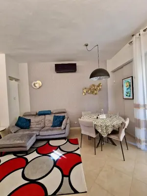 Area soggiorno di Novoli Chic: Cuore di Firenze