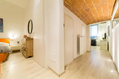 Letto o letti in una camera di Gallery Flat - S. Maria Novella