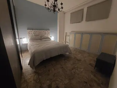 Letto o letti in una camera di Del Greco house Careggi