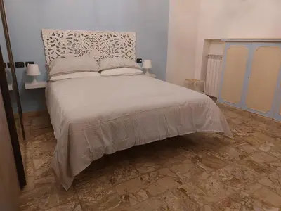 Letto o letti in una camera di Del Greco house Careggi