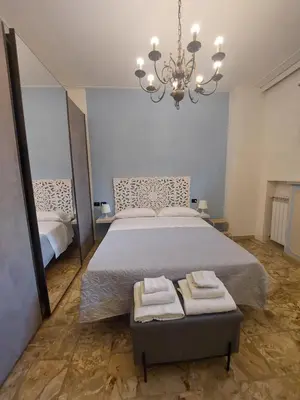 Letto o letti in una camera di Del Greco house Careggi
