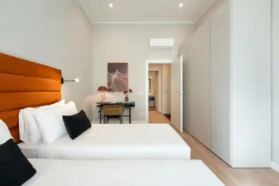 Letto o letti in una camera di Apartments Florence -The Tangerine Arcade with view
