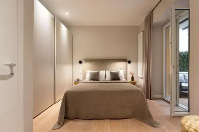 Letto o letti in una camera di Apartments Florence -The Tangerine Arcade with view