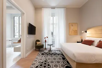 Letto o letti in una camera di Apartments Florence -The Tangerine Arcade with view