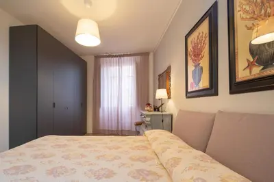 Letto o letti in una camera di Stunning & Luxurious 1BR apt 1 min walk by Duomo