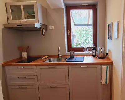 Cucina o angolo cottura di Mansarda luminosa e confortevole