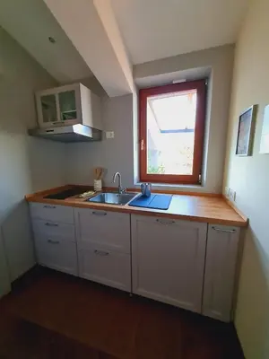 Cucina o angolo cottura di Mansarda luminosa e confortevole