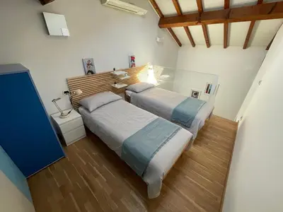 Letto o letti in una camera di Loft Casa EGLi