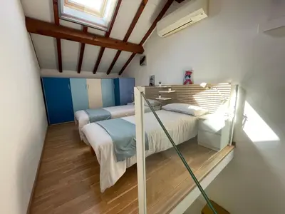 Letto o letti in una camera di Loft Casa EGLi
