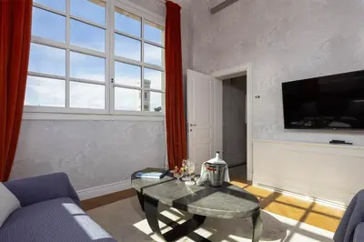 TV o dispositivi per l'intrattenimento presso Torretta Penthouse Luxury Apartment In Florence By Palazzo Pazzi Vitali