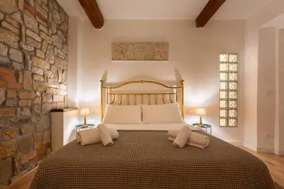 Letto o letti in una camera di Keys of Italy - Mercato 20 - Modern 1 bedroom nearby Mercato Centrale