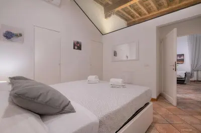 Letto o letti in una camera di Wine Apartments Florence Moscato
