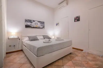 Letto o letti in una camera di Wine Apartments Florence Moscato