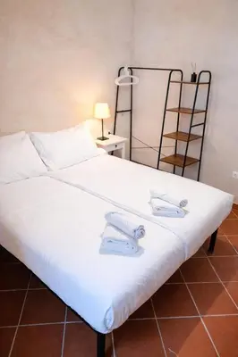 Letto o letti in una camera di Poggio 3 Lune