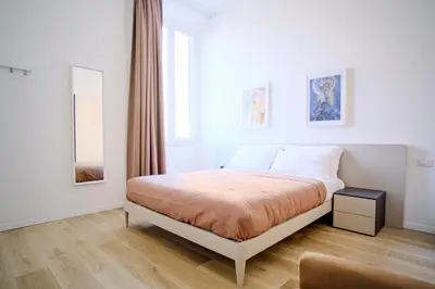 Letto o letti in una camera di Cavour - Boutique Home in Florence