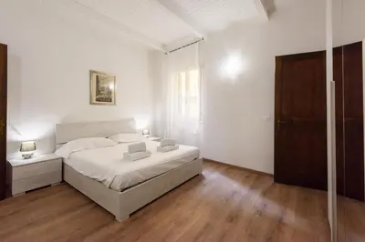 Letto o letti in una camera di Uffizi 3 bedrooms by Mmega