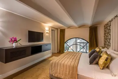 Letto o letti in una camera di Duomo Penthouse Luxury Apartment In Florence By Palazzo Pazzi Vitali